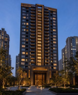 Luxury residential tower in Gurugram at blue hour